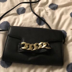 Metal detail hand clutch